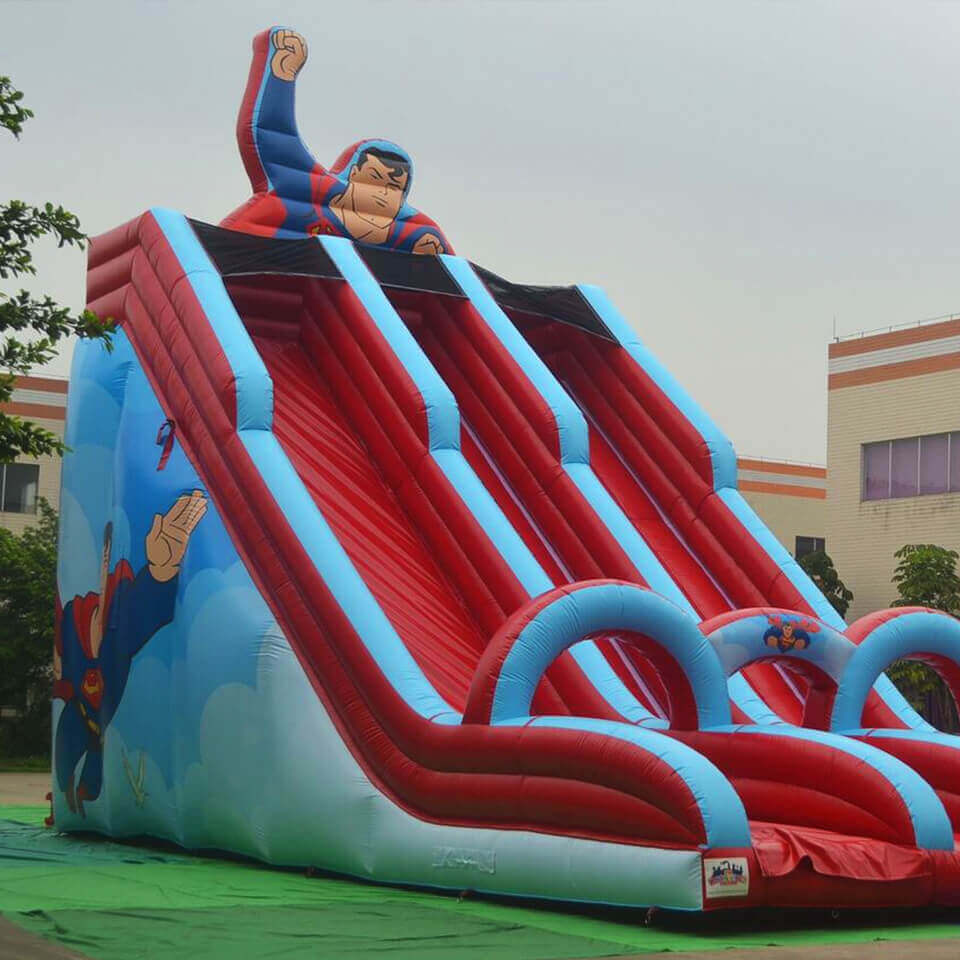 Superman themed inflatable slide